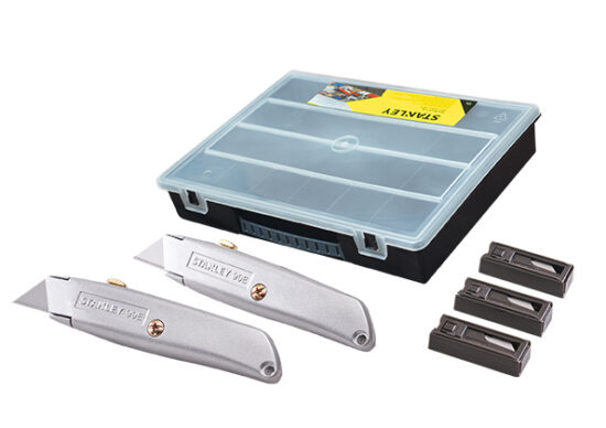 A set including two silver utility knives, three packs of replacement blades, and a black plastic storage case with a transparent lid.