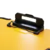 A close-up of a bright LED work light attached to a yellow DeWalt portable case with black corner protectors, featuring the DeWalt DEW182732 TSTAK™ Clipboard.
