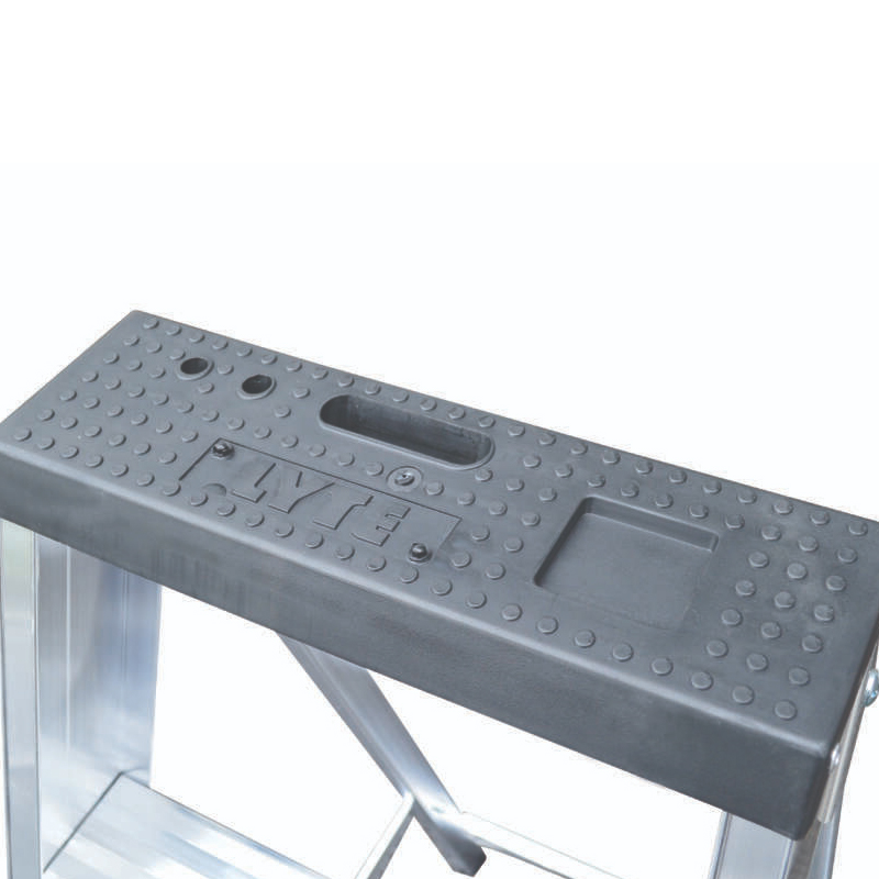Close-up of the Lyte NBSBP Aluminium Platform Stepladders top platform, which has a textured non-slip black surface with indents for holding tools and hardware.