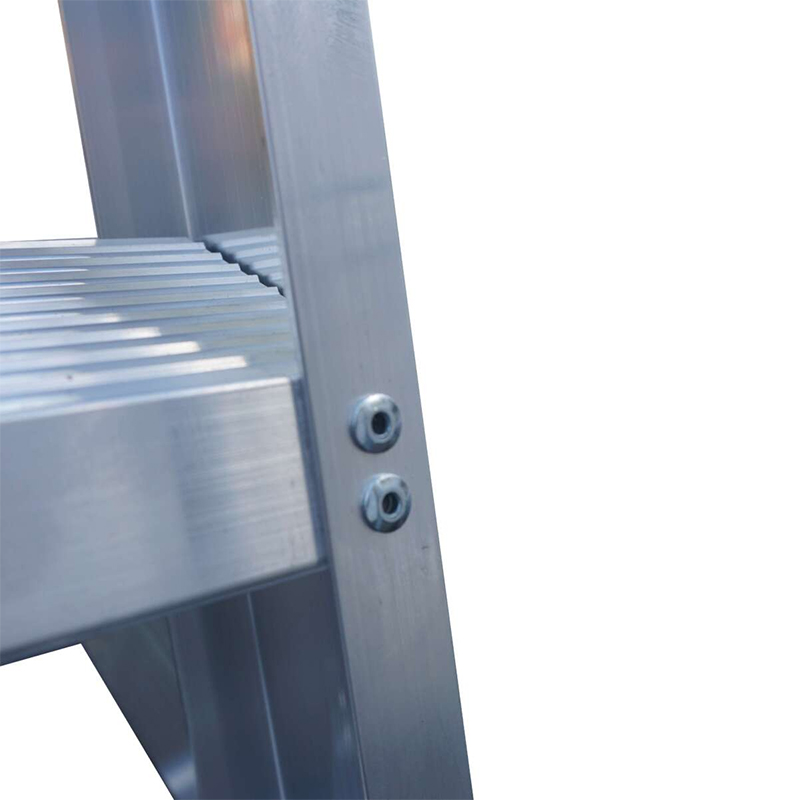 Close-up of Lyte WS Aluminium Warehouse Steps, highlighting the grooved steps and two bolts on the silver metal frame against a plain white background.