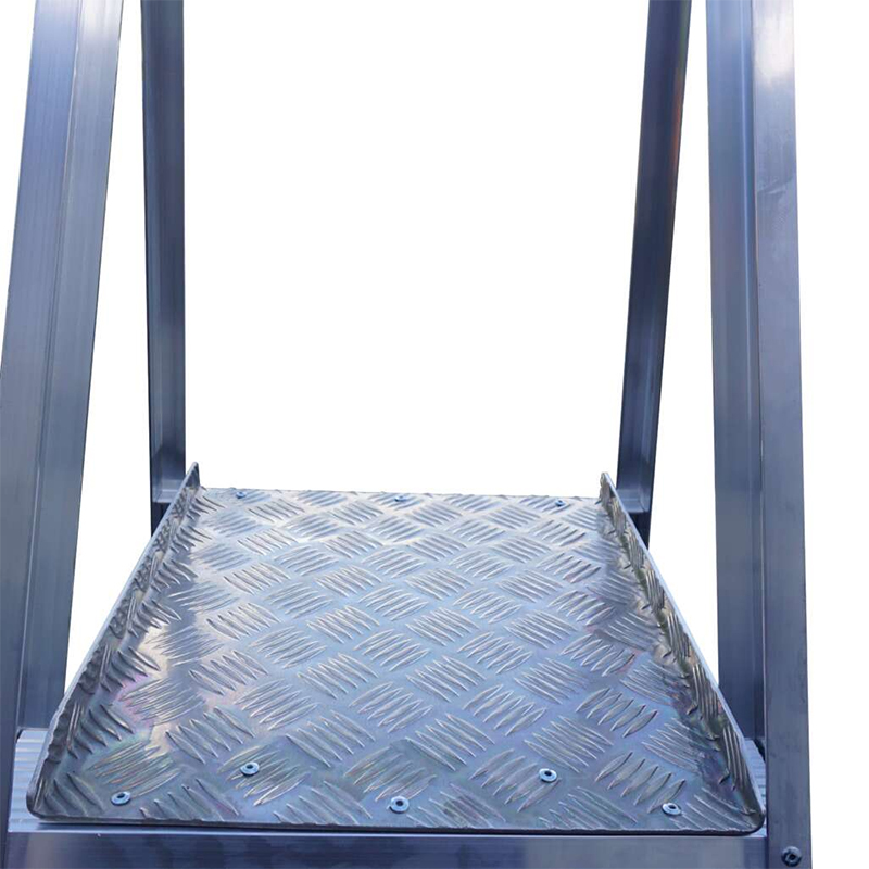 A close-up of a Lyte WS Aluminium Warehouse Steps metal step with a diamond plate pattern and two supporting side rails, shown against a white background.