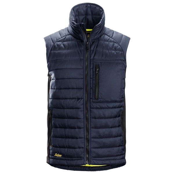 The Snickers 4512 AllroundWork 37.5® Insulator Vest in black is sleeveless with a high collar, front zip, zippered chest pocket, horizontal quilting, black side panels, and a subtle yellow logo near the hem.
