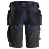 Back view of Snickers 6141 AllroundWork Stretch Shorts Holster Pockets, Black, featuring multiple holster pockets, reinforced seat and hips, utility loops, and a yellow Snickers logo tag on the waistband.