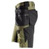 Side view of Snickers 6175 AllroundWork 4-Way Stretch Shorts in black, featuring holster pockets, multiple reinforced pockets, zippers, and loops for carrying tools and accessories.