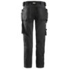 Black work trousers with multiple pockets and reinforced knee areas, shown from the back. The trousers feature tool holders and utility pouches on the sides, suitable for construction or trade work.