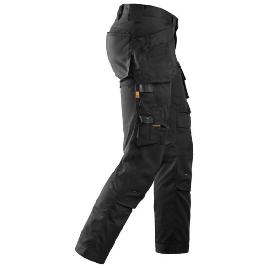 Black work pants with multiple pockets and tool loops, designed for utility and durability. The pants are shown from the side, displaying reinforced knees and several compartments for carrying tools.
