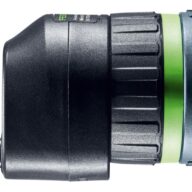 A close-up of a black and metallic power tool attachment with a grooved, rubberized end and a green and blue ring showing directional arrows and letters.