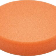 A round, orange foam pad with a smooth texture, viewed from a slight angle against a white background.
