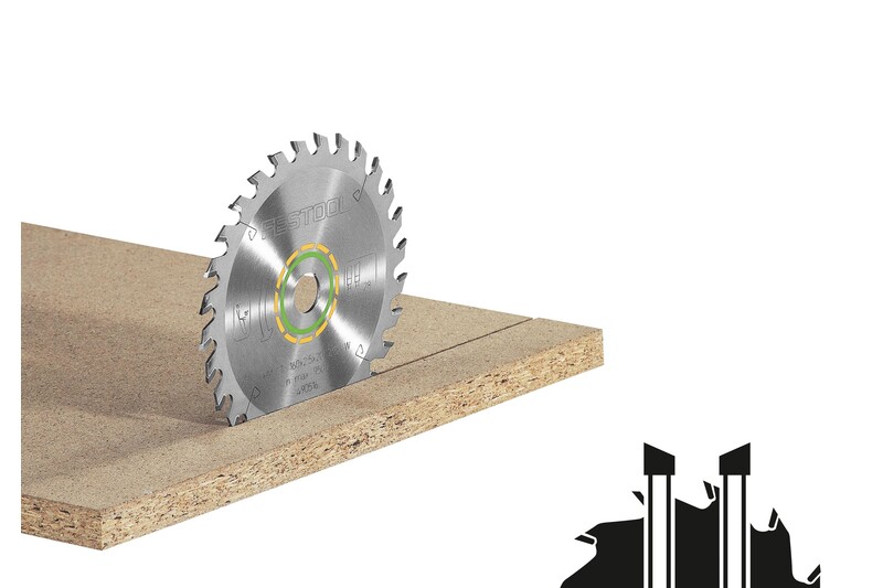 A circular saw blade partially cuts through a piece of particle board, with wood dust and two straight lines visible on the board. The background is white.
