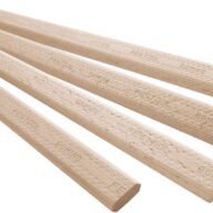 Four light-colored wooden dowels with patterned surfaces, each labeled FESTOOL DOMINO, are arranged diagonally against a white background.