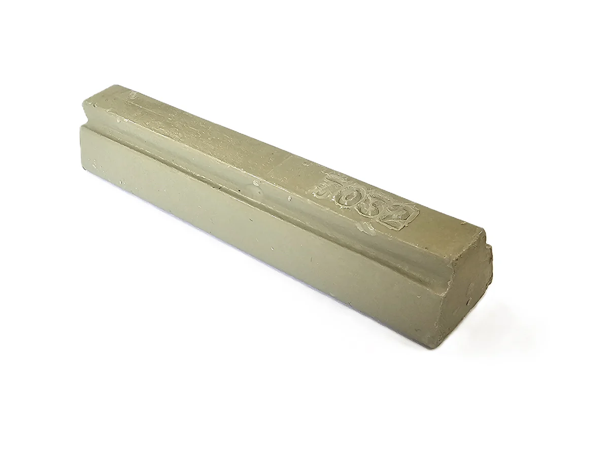 A rectangular Konig 8cm Hard Wax Filler Stick 142 Medium Oak rests on a white background, with a smooth, slightly glossy surface.