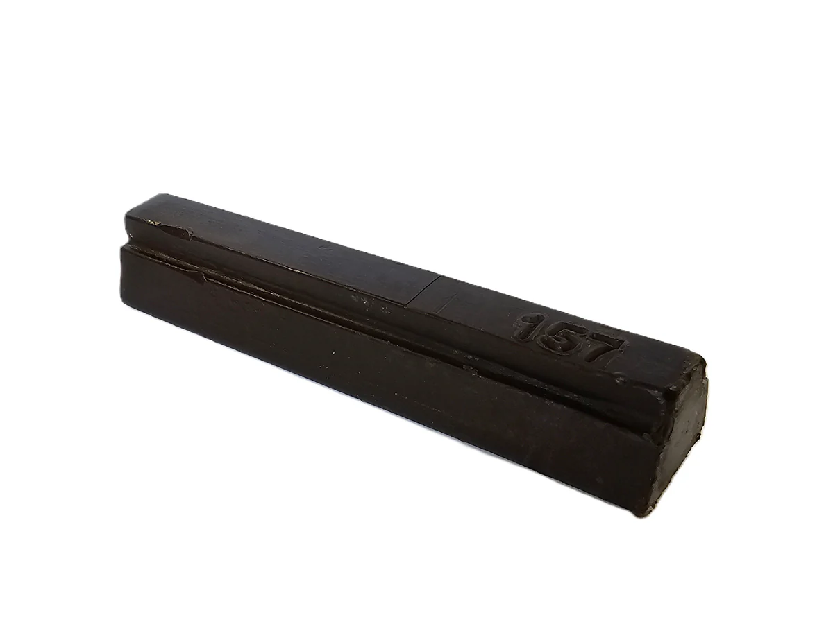 A rectangular, dark-colored piece of Konig Hard Wax Rosewood Single 1118/96 rests on a white background.