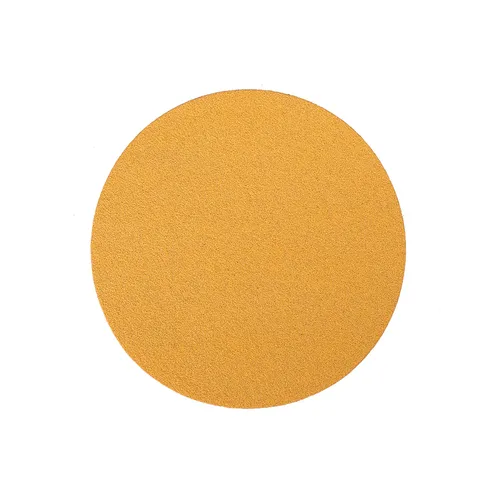 A top-down view of a round, flat Gold Ø 150 mm Grip sandpaper disc with a yellow-gold finish on a plain white background.