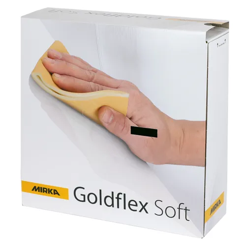 A hand uses a flexible Mirka Goldflex Soft 115 x 125 mm P320 sanding pad on a white surface, shown on the product box.