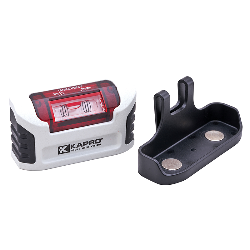 A small white and black Kapro gradient level tool with a red vial window, shown next to its detachable black magnetic base.