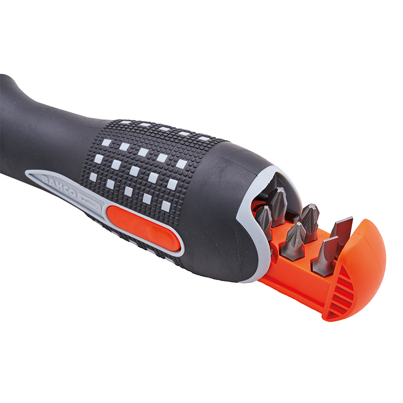 A close-up of a black and orange screwdriver handle with a partially open built-in compartment showing several screwdriver bits inside.