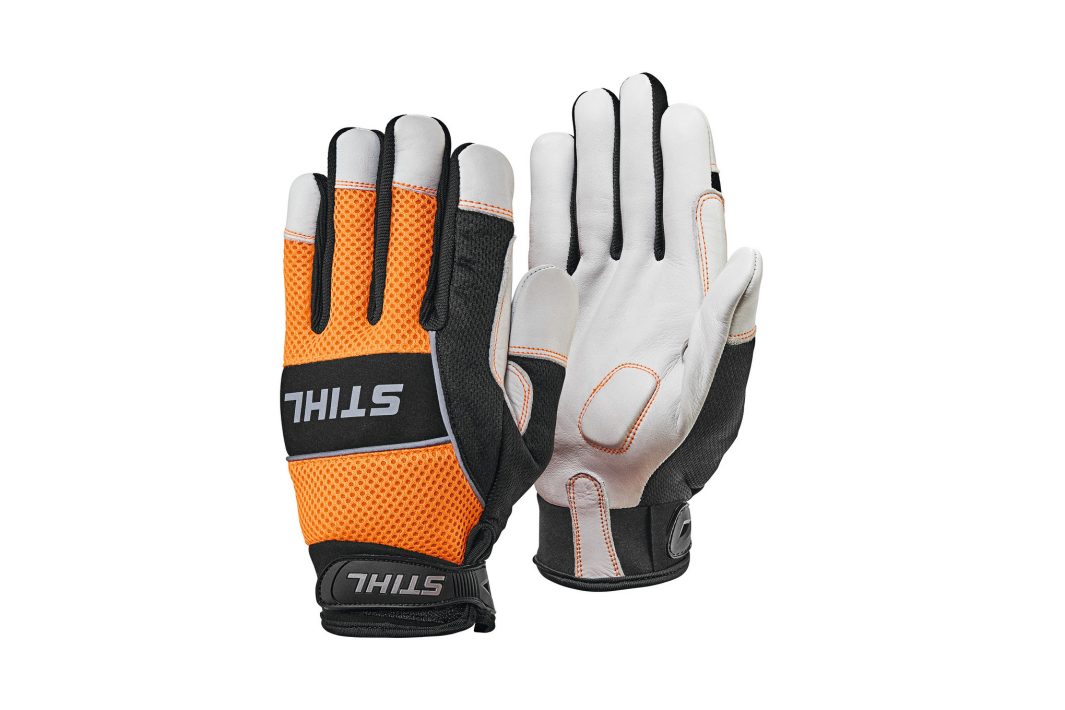 A pair of work gloves shown front and back, in orange, black, and white, with reinforced palms and branding on the wrist straps.