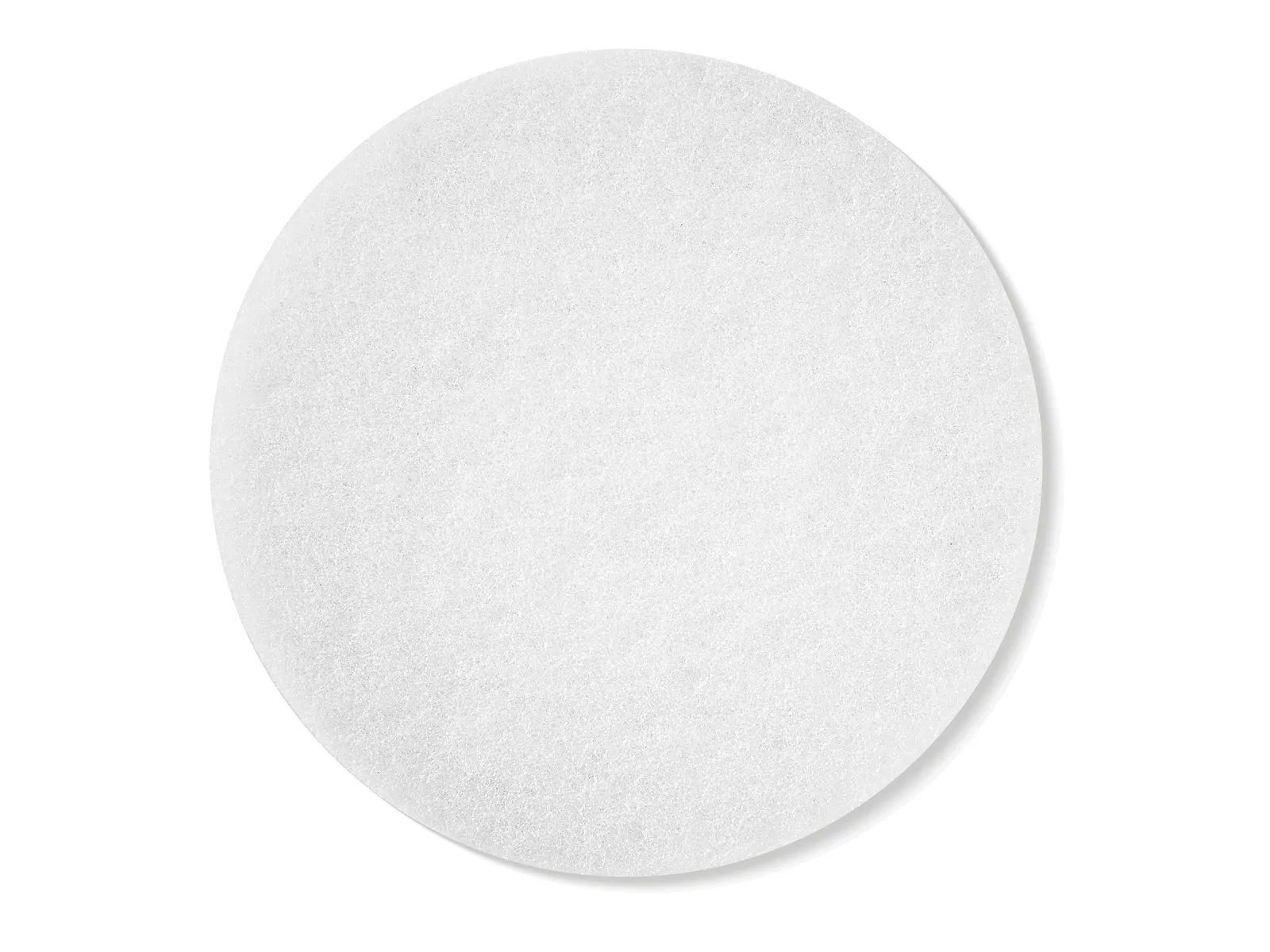 A white, circular filter or pad with a soft, textured surface on a plain white background.