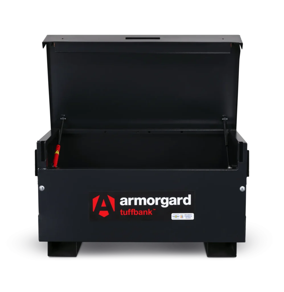 The Armorgard TuffBank TB2 Secure Site Storage Box is black with its lid open, showing an empty interior and front logo.