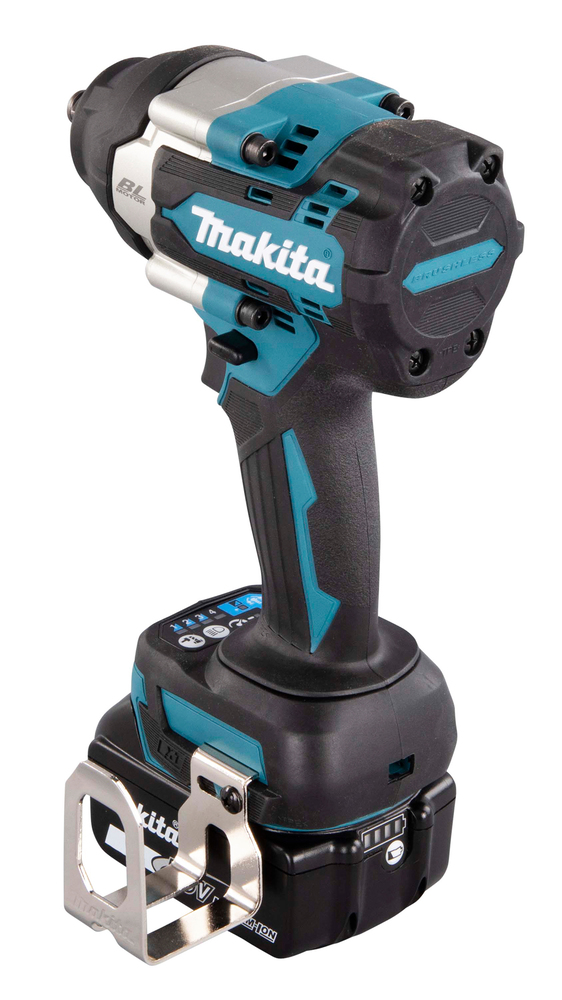 A cordless Makita impact driver with a black and teal body, battery at the base, and a metal belt clip on the handle.