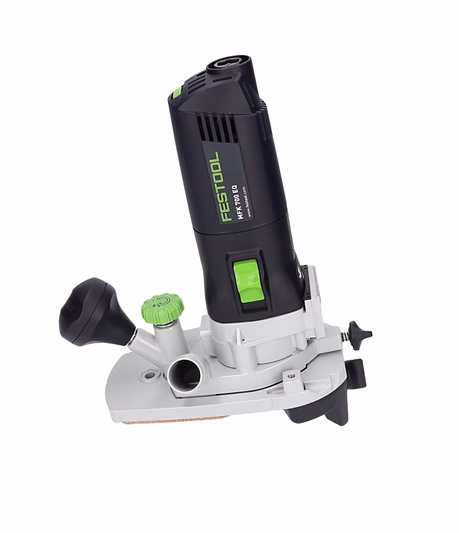 A handheld Festool edge router features a black and green motor housing, side handle, adjustment knobs, and a silver base for woodworking.