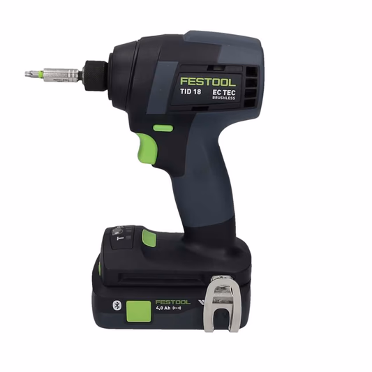 A Festool cordless impact driver, TID 18 model, black and green with battery pack and belt clip, upright on a white background.