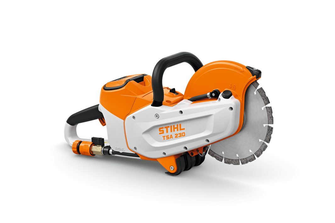 The Stihl TSA230 Battery Stone Saw, in orange, white, and black with a circular blade, is displayed on a white background.