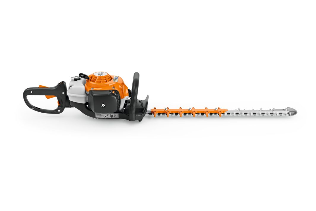 A Stihl HS 82 RC-E 60cm/24" hedge trimmer in orange and white with a long silver blade and black handles on a white background.