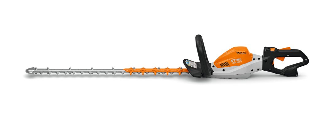 The Stihl HSA 130R 30" cordless hedge trimmer features a black handle, 30-inch silver blade, and orange and white finish on white.