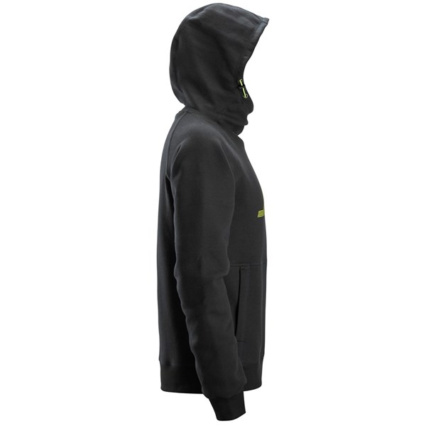 A person in profile faces right, wearing a navy hoodie with the hood up. The hoodie has a front pocket and small yellow chest design.