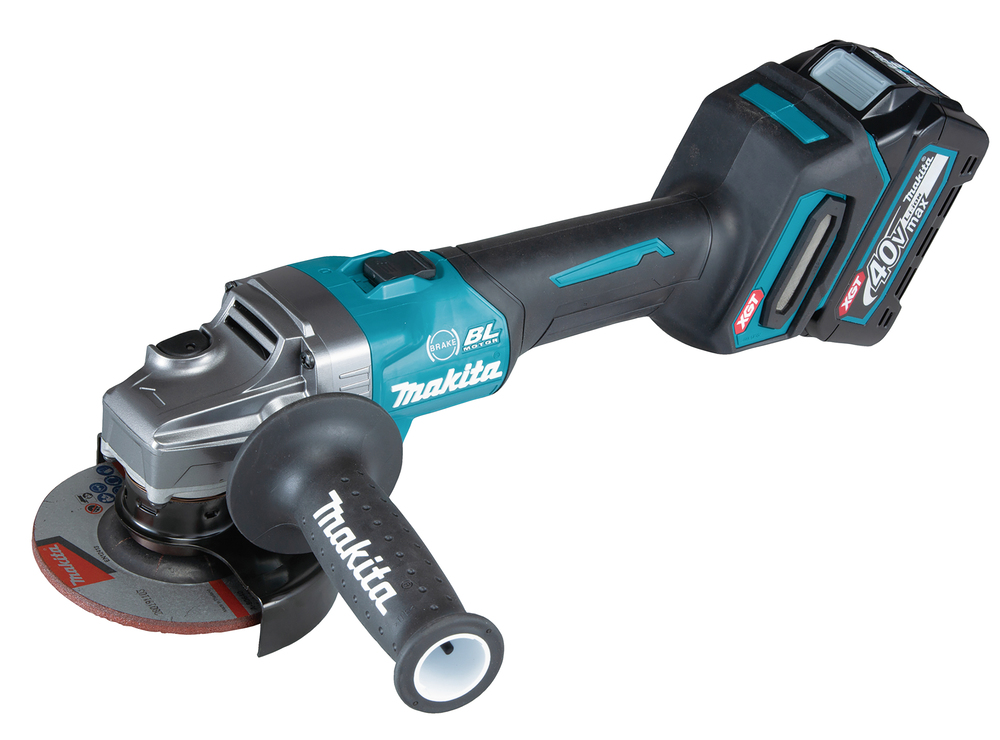 Compatible with Makita DHP487SF 18v Combi Drill (3ah battery & charger), cordless angle grinder with black/teal body, silver head, side handle, and abrasive disc.