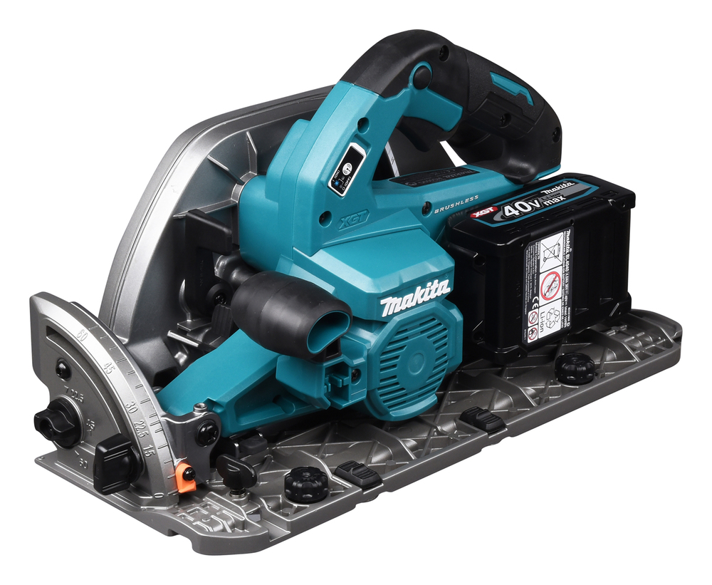 A teal and black Makita DHP487SF 18V Combi Drill with adjustment knobs, 3Ah battery, and charger on a metal base, white background.