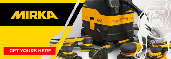 A variety of yellow and black Mirka power tools and a vacuum system are displayed.