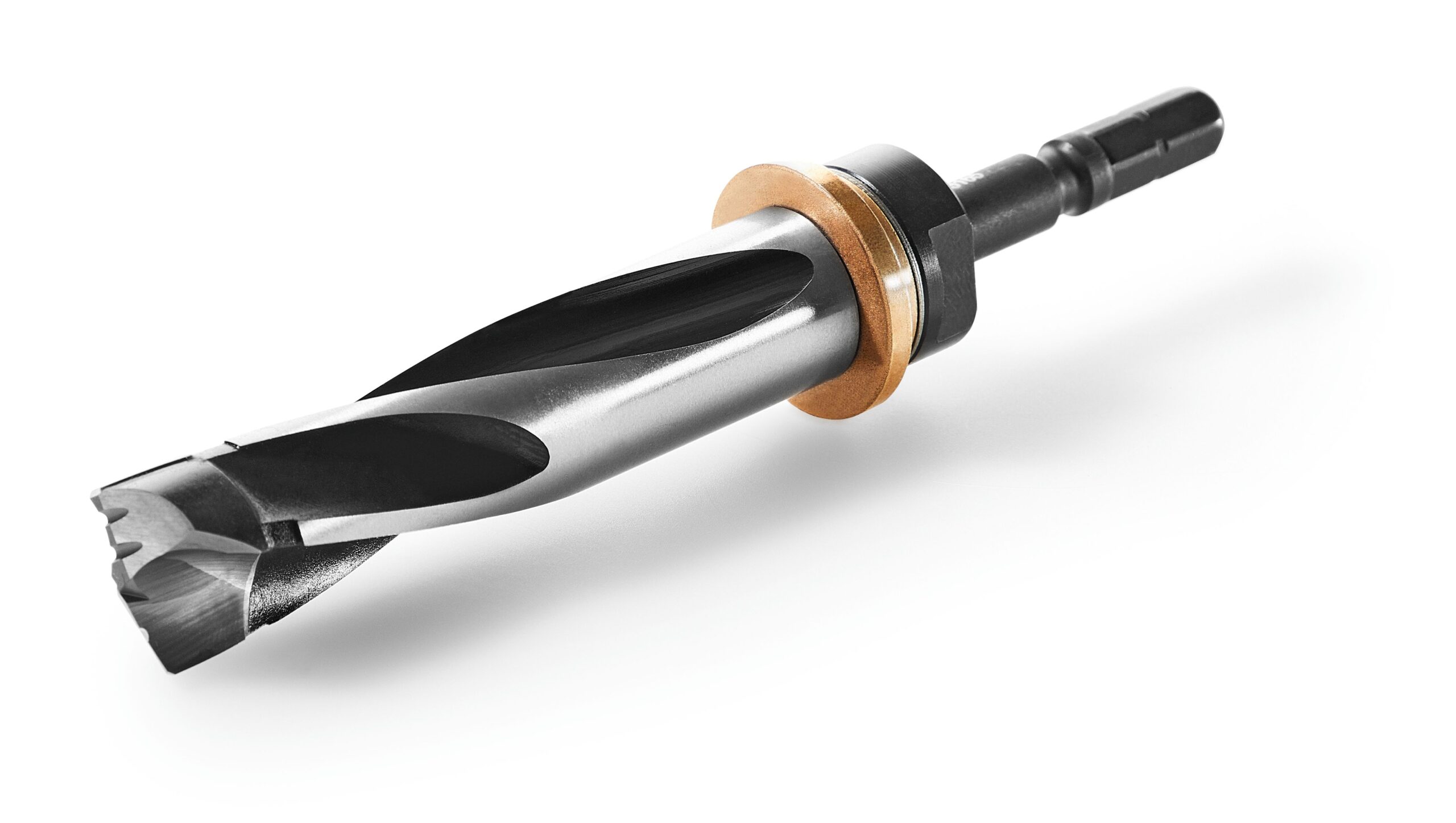 A close-up of a metal drill bit with a sharp spiral design, black shank, and gold-colored ring near its base on a white surface.