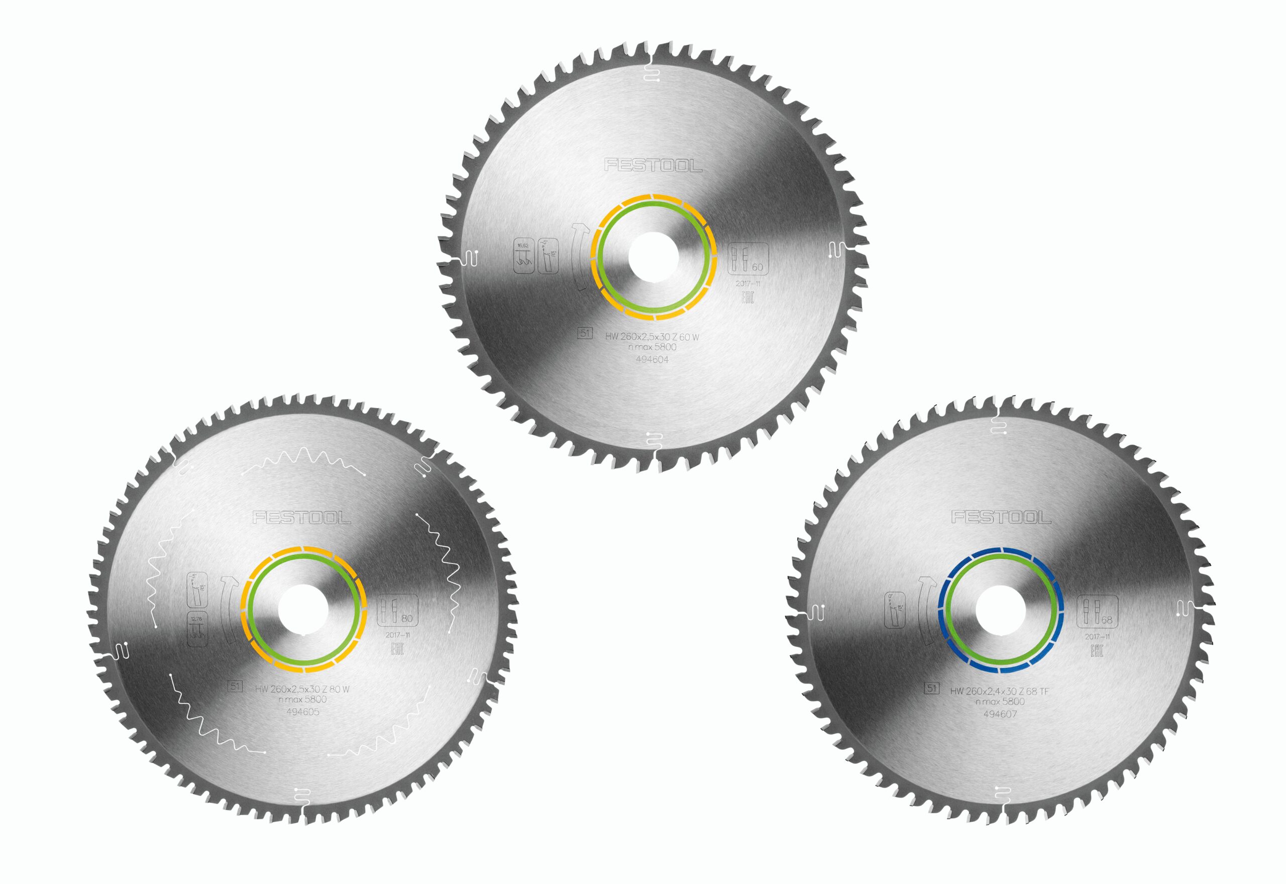 Three Festool 578570 saw blades with metal finishes and colored center rings on a white background in a triangular arrangement.