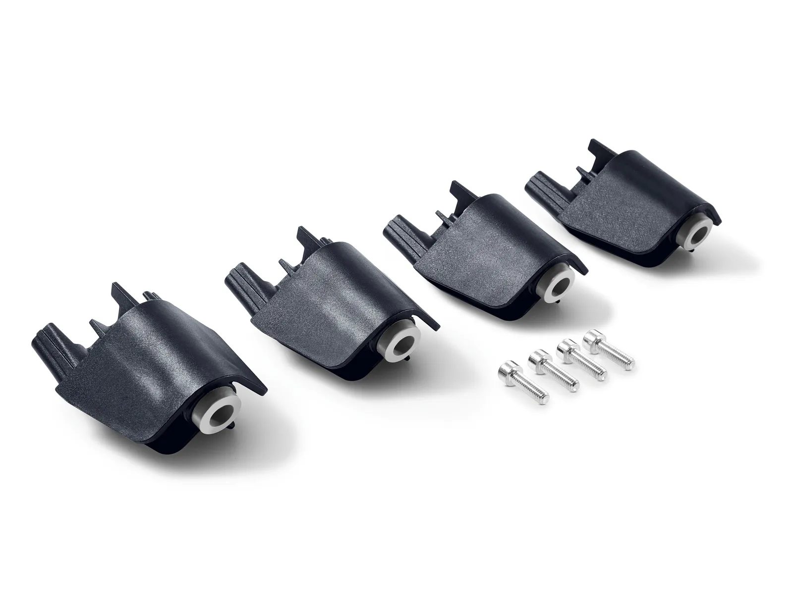 Four black mounting brackets with silver circular inserts are lined up beside four silver screws on a white background.