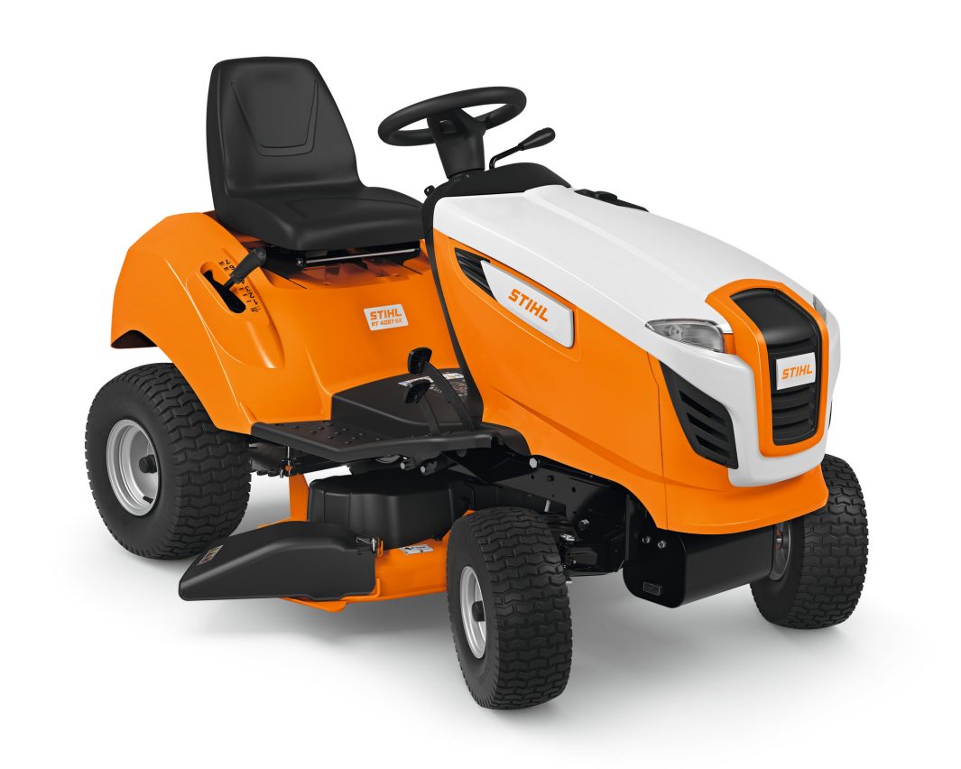 The Stihl RT 4097.1 SX Ride-on Mower is orange and white with a black seat, steering wheel, and large tyres on a white background.