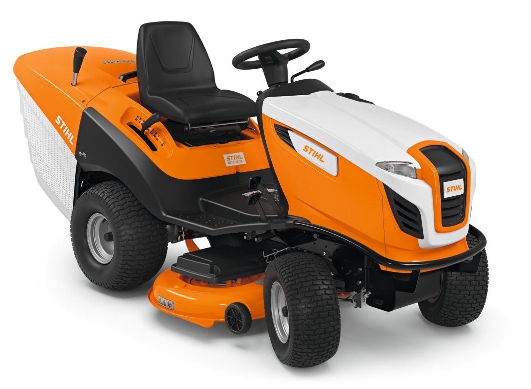 The Stihl RT 6112.1 ZL Ride-on Mower has a bright orange and white body, black seat, large rear grass box, and sturdy tyres.