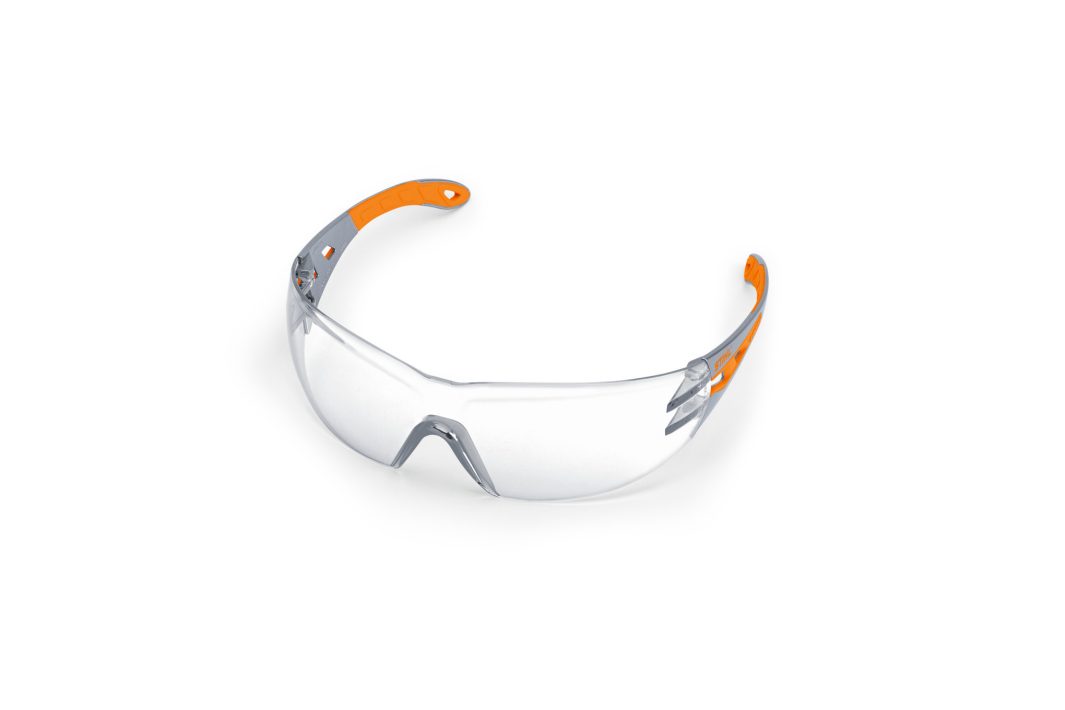 Stihl LIGHT PLUS clear safety glasses with clear lenses and orange/grey arms for eye protection on a white background.