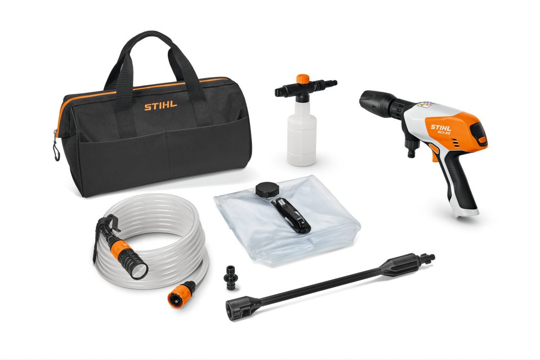A Stihl RCA 20.0 (AS) Washer kit with bag, spray gun, hose, lance, nozzle, water bag, and foam bottle on a white background.