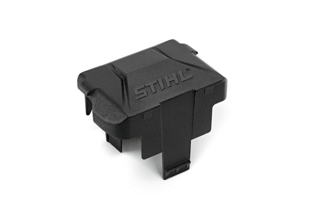 A Stihl AK Battery Slot Cover, black plastic, designed for chainsaws, displayed on a white background.