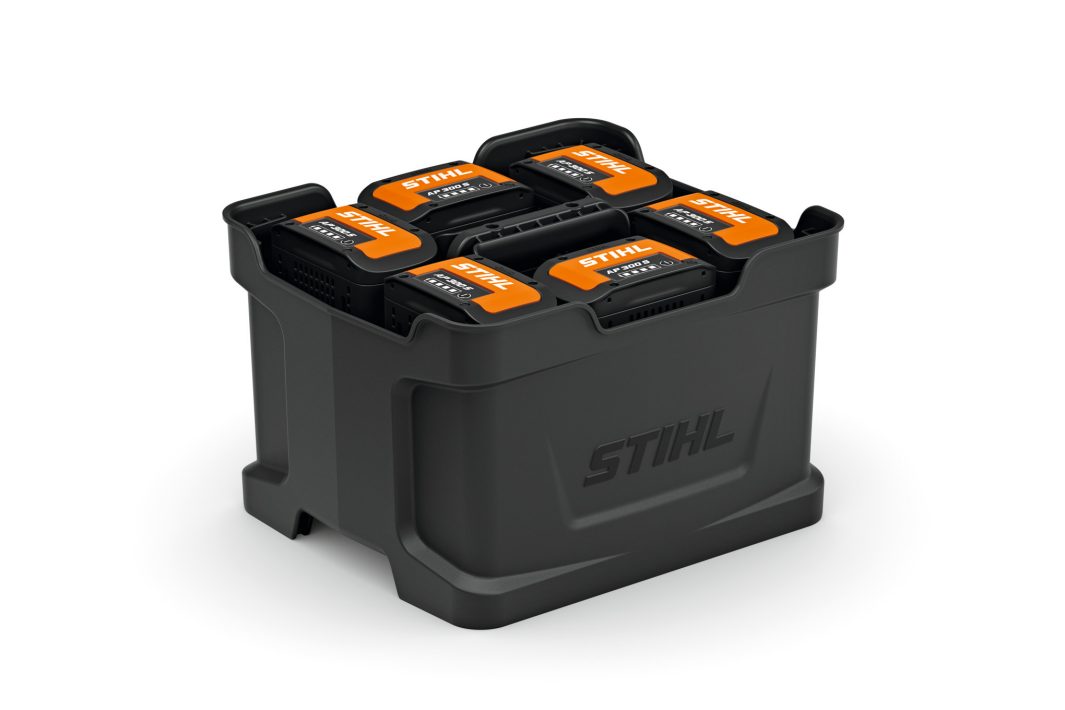The Stihl AP Battery Carrying Box holds six batteries, organised with labels facing upwards in a sleek black box.