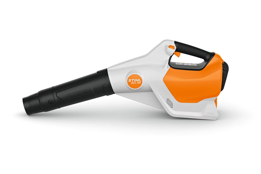 A battery-powered STIHL leaf blower with an orange, white, and black design, shown on a plain white background, nozzle facing left.
