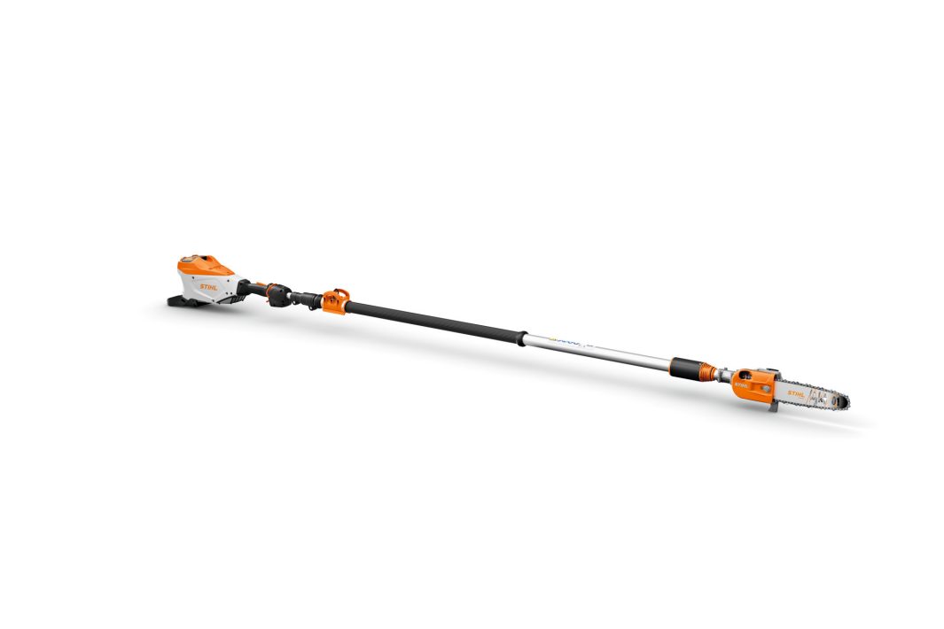 A Stihl-branded pole saw with an orange and white motor housing, a telescopic shaft, and a chainsaw blade on a white background.