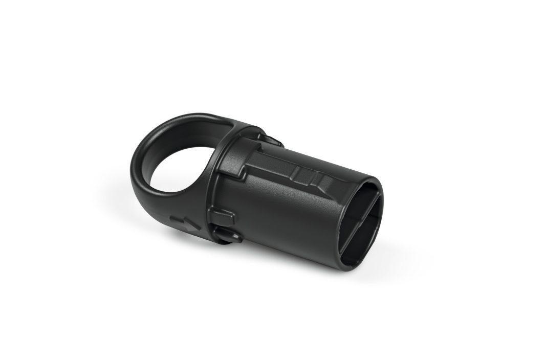 A black plastic vacuum cleaner nozzle with a rounded handle, shown isolated on a white background.