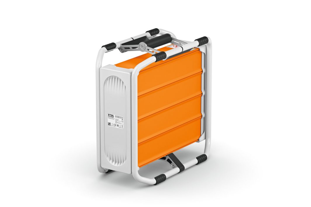 A compact, foldable orange and white step stool with black rubber grips and handle stands upright on a white background.