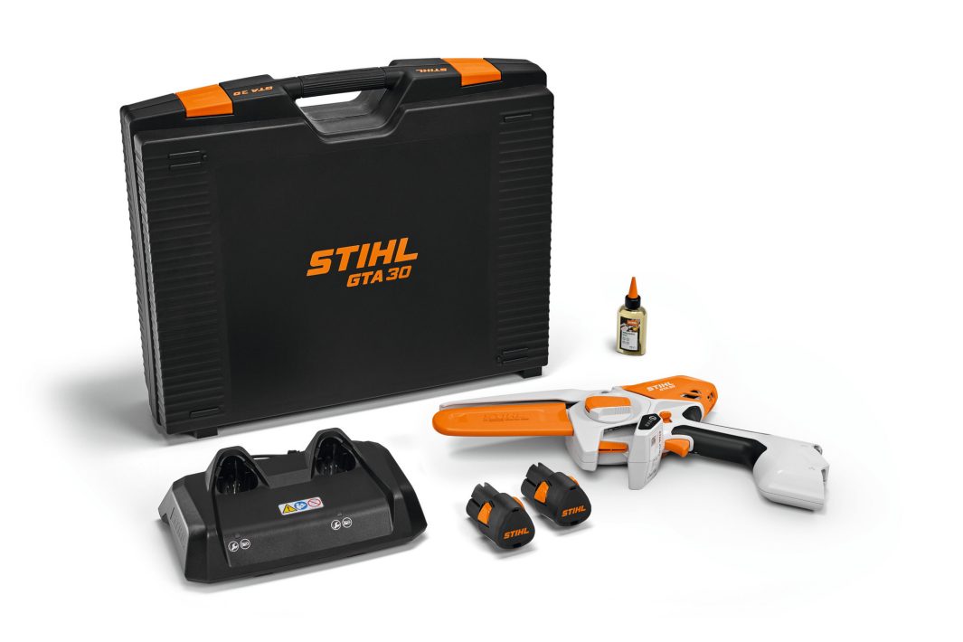 The Stihl GTA 30 (AS) Pruner SET includes a cordless pruner, two AS2 batteries, a dual charger, and oil on a white background.